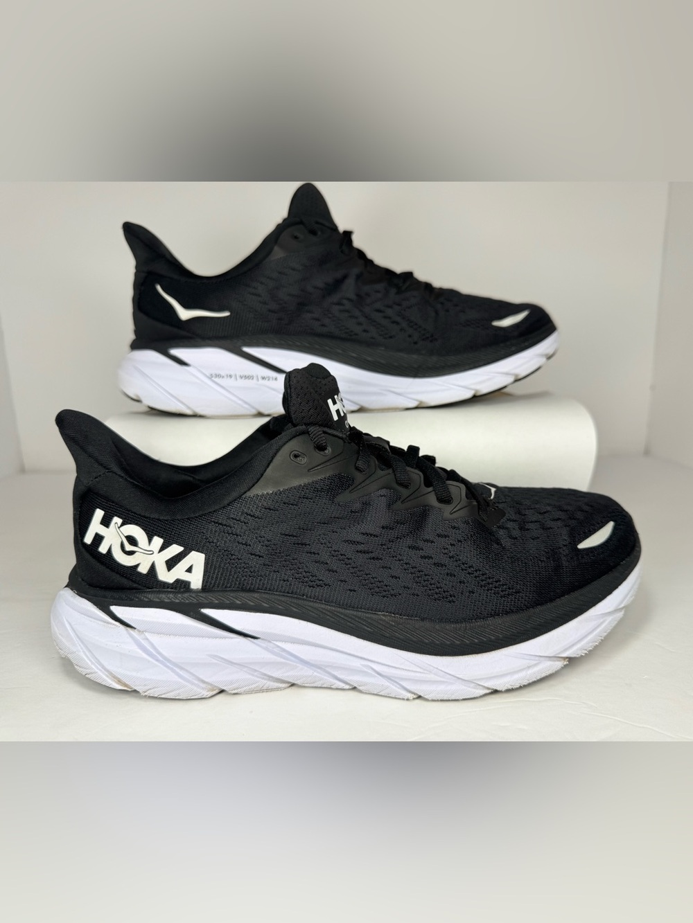 Hoka one one Clifton woman’s size 8 Black and White Cushioning Running Shoes